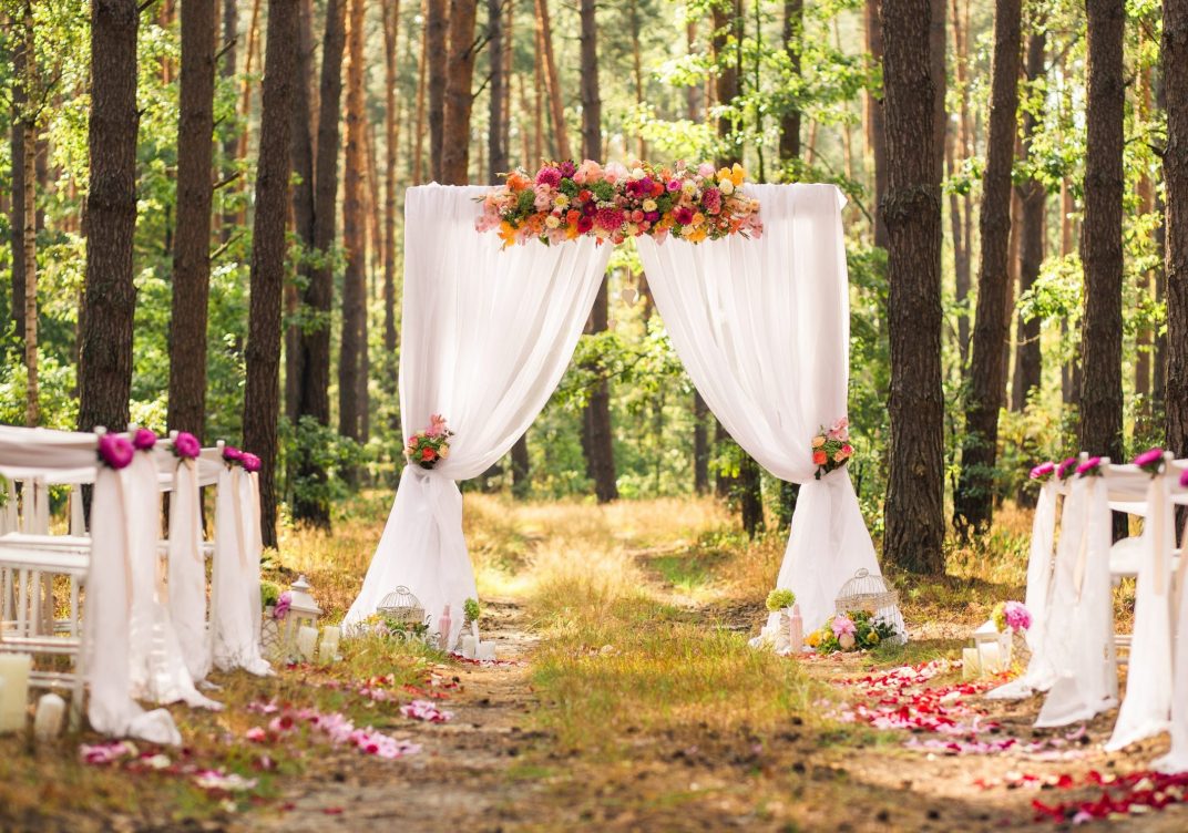 Beautiful romantic festive place made with wooden square and flo